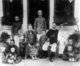 Malaysia / Singapore: A well-to-do Straits Peranakan family of Penang, late 19th century, the men dressed in Chinese style, the women in Malay style